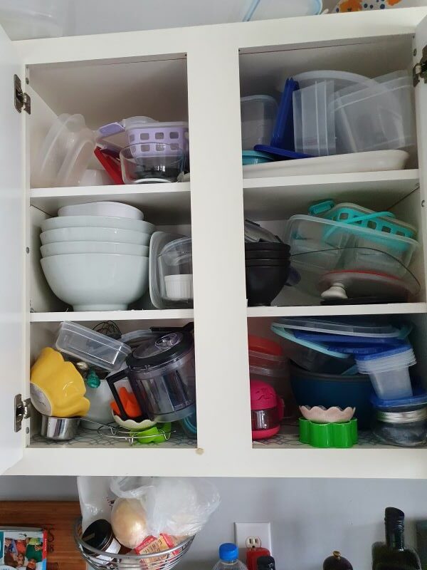 Cluttered Disorganized Kitchen Cabinet