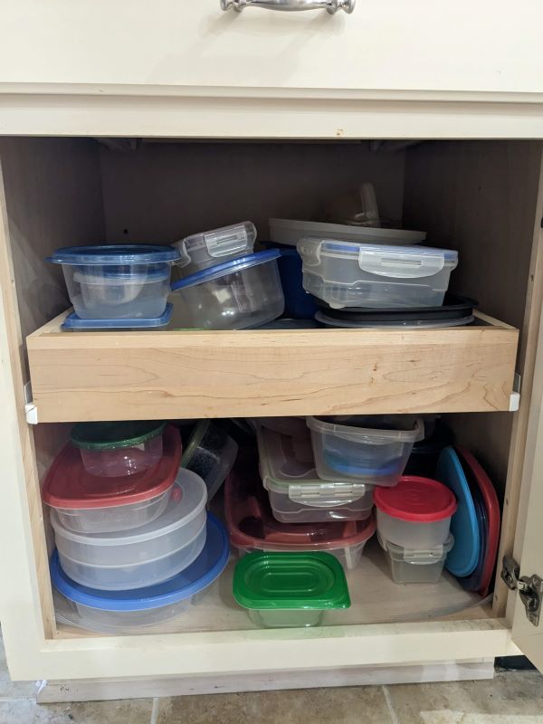Chaotic tupperware cabinet